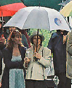 Penny and her Davis Langdon & Everest umbrella