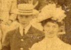 A young beau in his college boater walking out with floosie in the fancy millinery